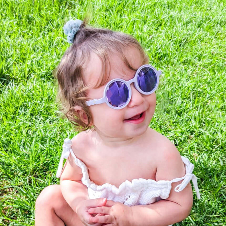 Lilac purple bb baby sunglasses with purple reflective UV protective lenses.